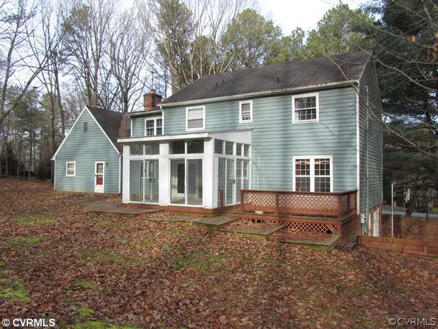10819 Cherokee Road Midlothian, VA 23113 - Photo 2 of 24 a front view of a house with a yard