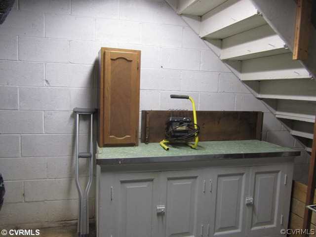 10819 Cherokee Road Midlothian, VA 23113 - Photo 22 of 24 a bathroom with a sink and a mirror