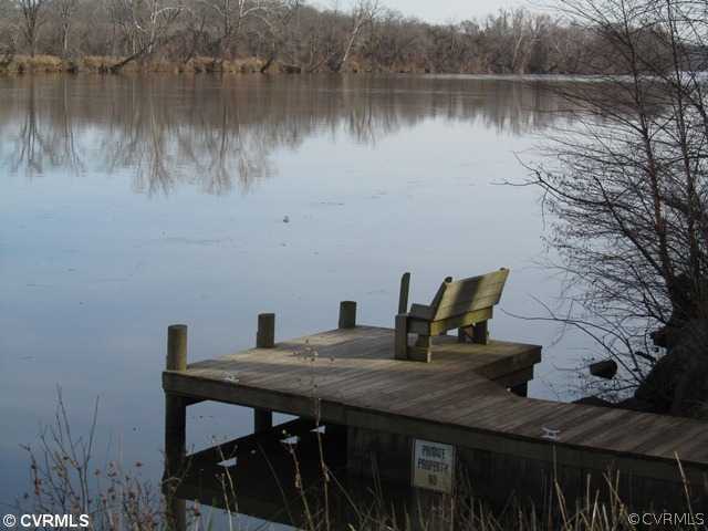 10819 Cherokee Road Midlothian, VA 23113 - Photo 23 of 24 a view of a lake with furniture