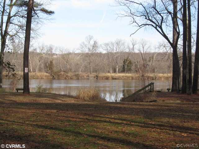 10819 Cherokee Road Midlothian, VA 23113 - Photo 3 of 24 a view of a lake view