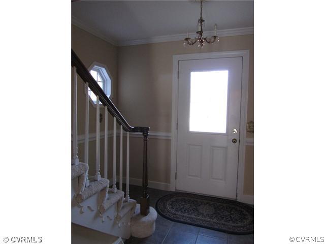 10819 Cherokee Road Midlothian, VA 23113 - Photo 4 of 24 a view of a hallway with windows