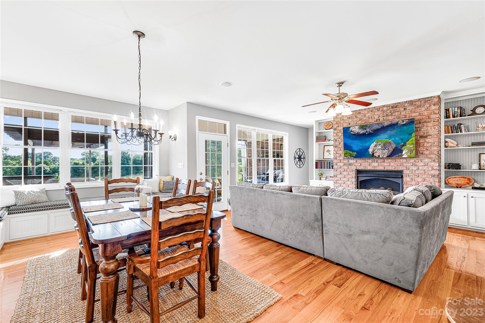 5423 Reepsville Road Vale, NC 28168 - Photo 14 of 48 a living room with furniture and a floor to ceiling window