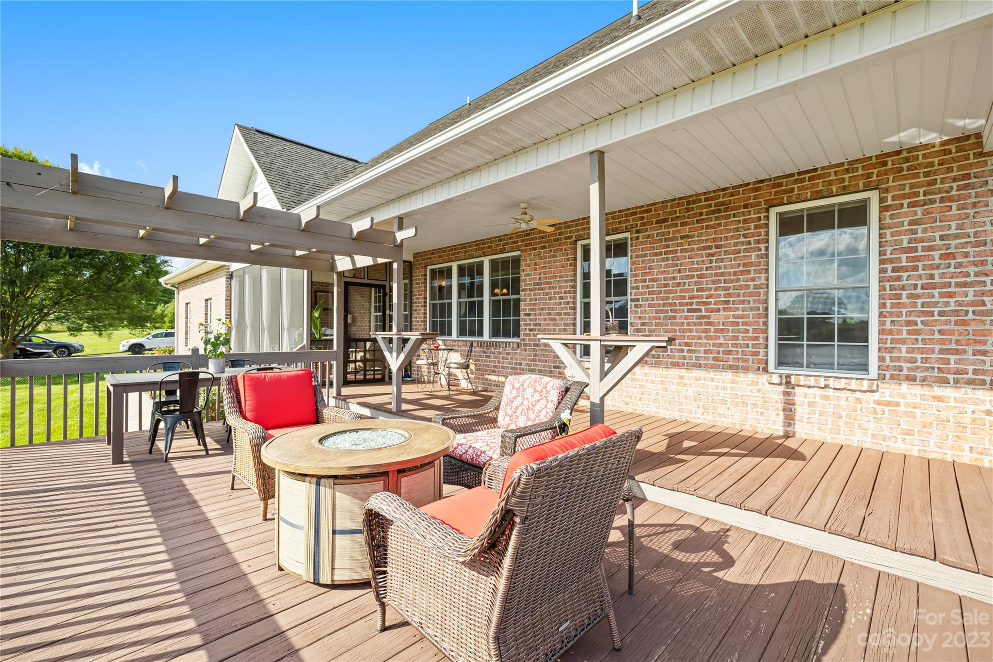 5423 Reepsville Road Vale, NC 28168 - Photo 30 of 48 a view of a patio with dining table and chairs with a small stove