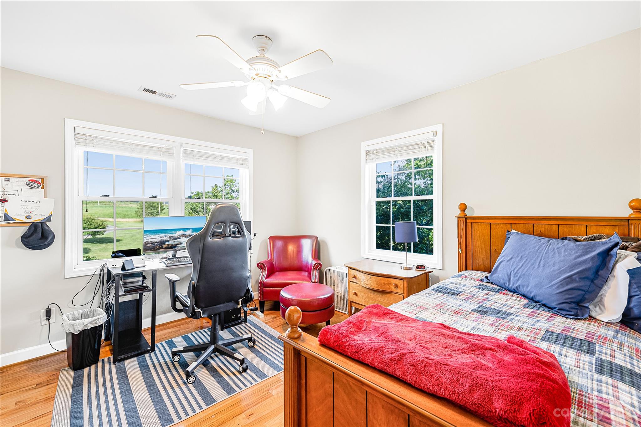 5423 Reepsville Road Vale, NC 28168 - Photo 38 of 48 a bedroom with a bed and wooden floor