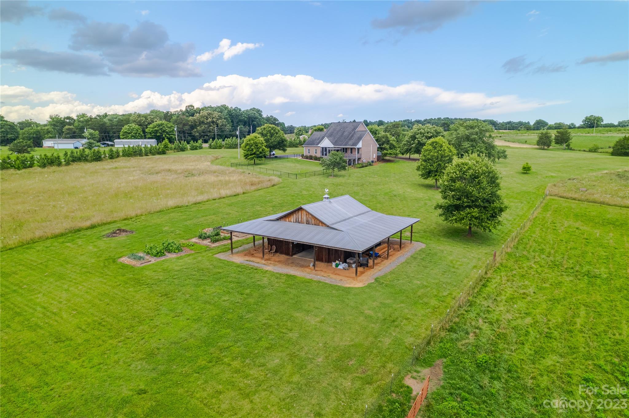 5423 Reepsville Road Vale, NC 28168 - Photo 44 of 48 an aerial view of a house with garden space and ocean view