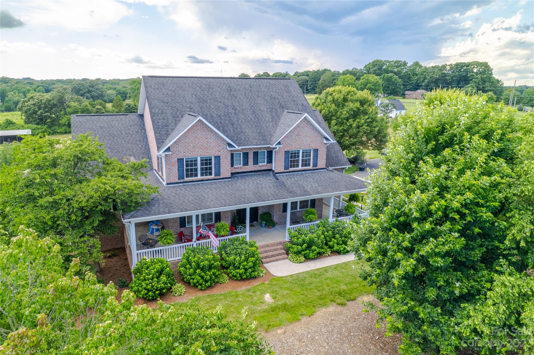5423 Reepsville Road Vale, NC 28168 - Photo 45 of 48 a aerial view of a house next to a yard