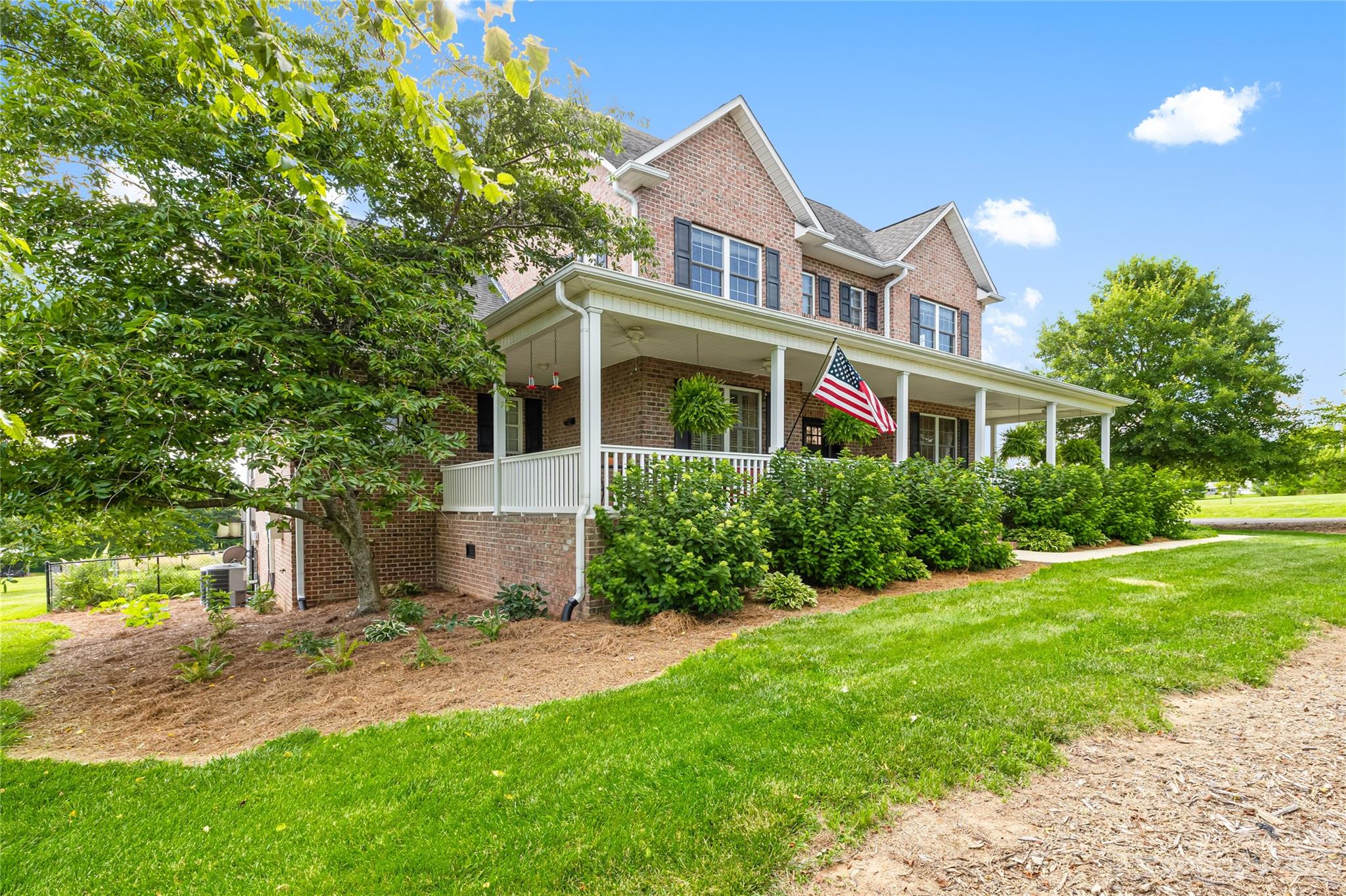 5423 Reepsville Road Vale, NC 28168 - Photo 6 of 48 a front view of a house with a yard and trees