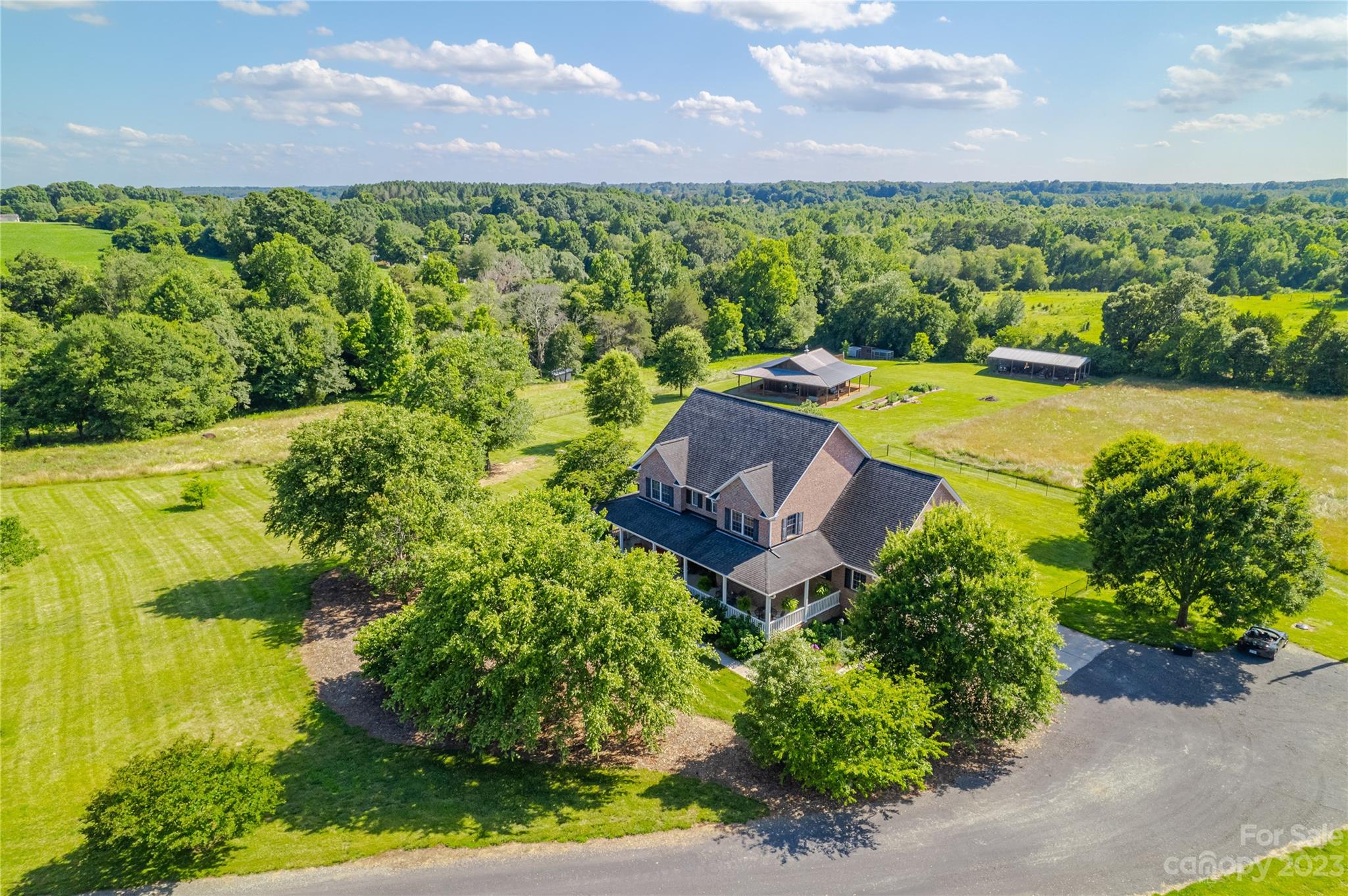 5423 Reepsville Road Vale, NC 28168 - Photo 7 of 48 an aerial view of a house with a garden