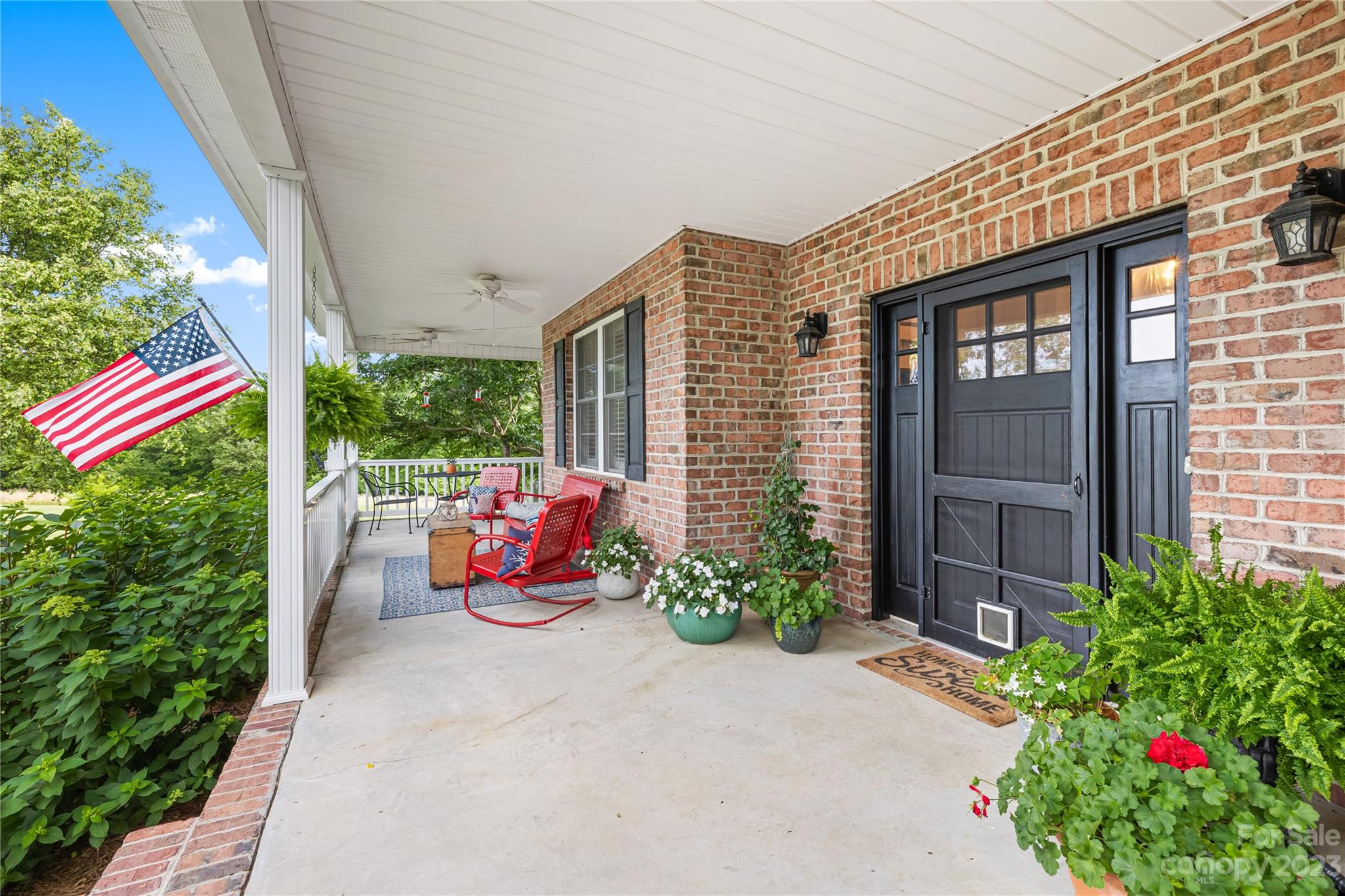 5423 Reepsville Road Vale, NC 28168 - Photo 8 of 48 a backyard of a house with outdoor seating