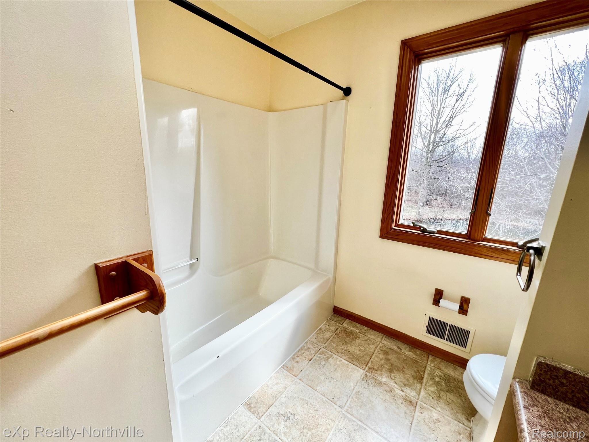 6573 Pinckney Road Pinckney, MI 48169 - Photo 12 of 20 Upstairs Bathroom - Shower