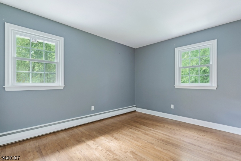 247 Spencer Road Bernards, NJ 07920 - Photo 44 of 48 a view of a room with blue walls and window