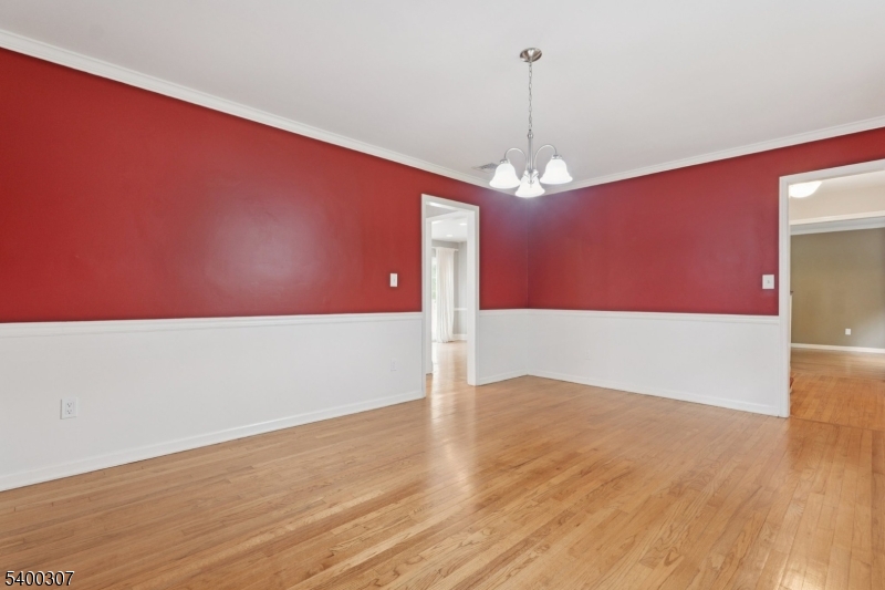 247 Spencer Road Bernards, NJ 07920 - Photo 7 of 48 a view of a room with wooden floor