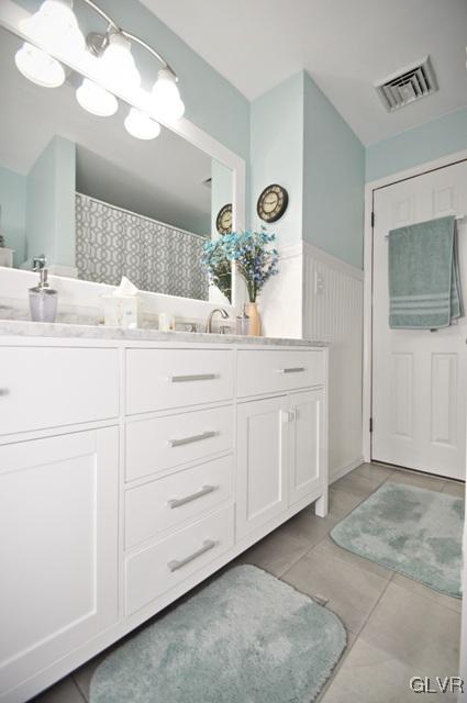 1251 Glenbrook Road Bartonsville, PA 18321 - Photo 19 of 37 a bathroom with a sink and a mirror