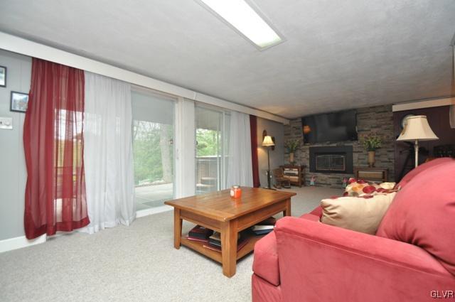 1251 Glenbrook Road Bartonsville, PA 18321 - Photo 21 of 37 a living room with furniture and a window