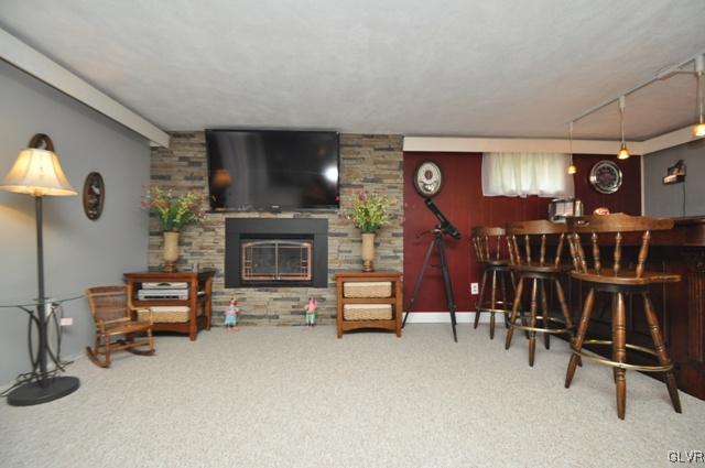 1251 Glenbrook Road Bartonsville, PA 18321 - Photo 24 of 37 a view of a livingroom with furniture and a fireplace