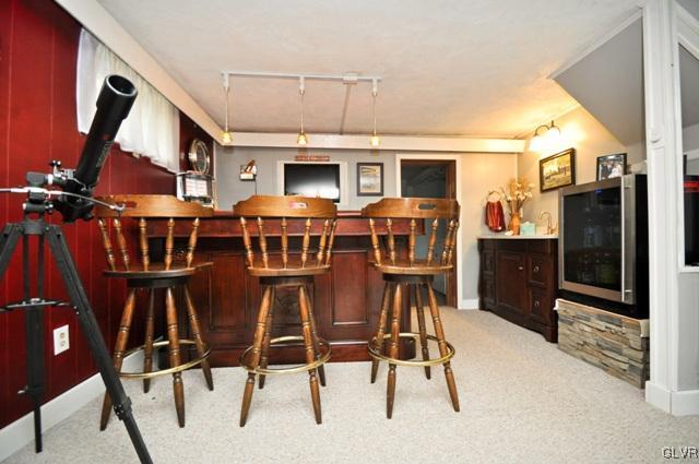 1251 Glenbrook Road Bartonsville, PA 18321 - Photo 25 of 37 a view of a dining room with furniture window and wooden floor