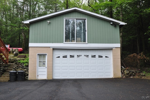 1251 Glenbrook Road Bartonsville, PA 18321 - Photo 34 of 37 a house with a outdoor space