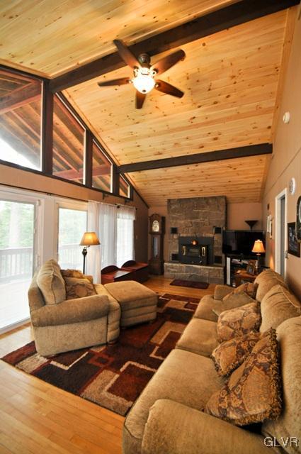 1251 Glenbrook Road Bartonsville, PA 18321 - Photo 6 of 37 a bedroom with furniture and a large window