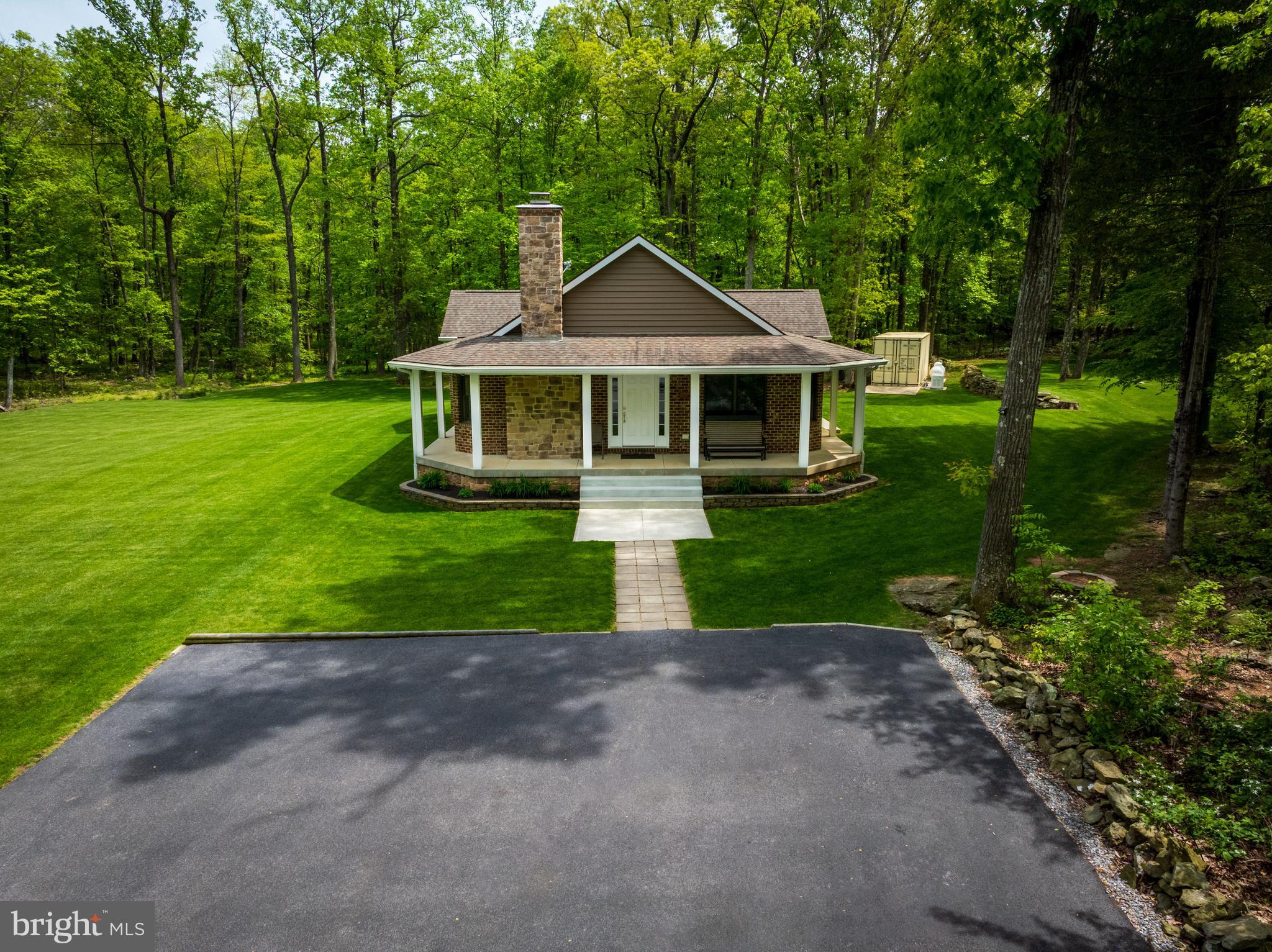 4740 Ford Fields Road Myersville, MD 21773 - Photo 27 of 147 a front view of a house with yard