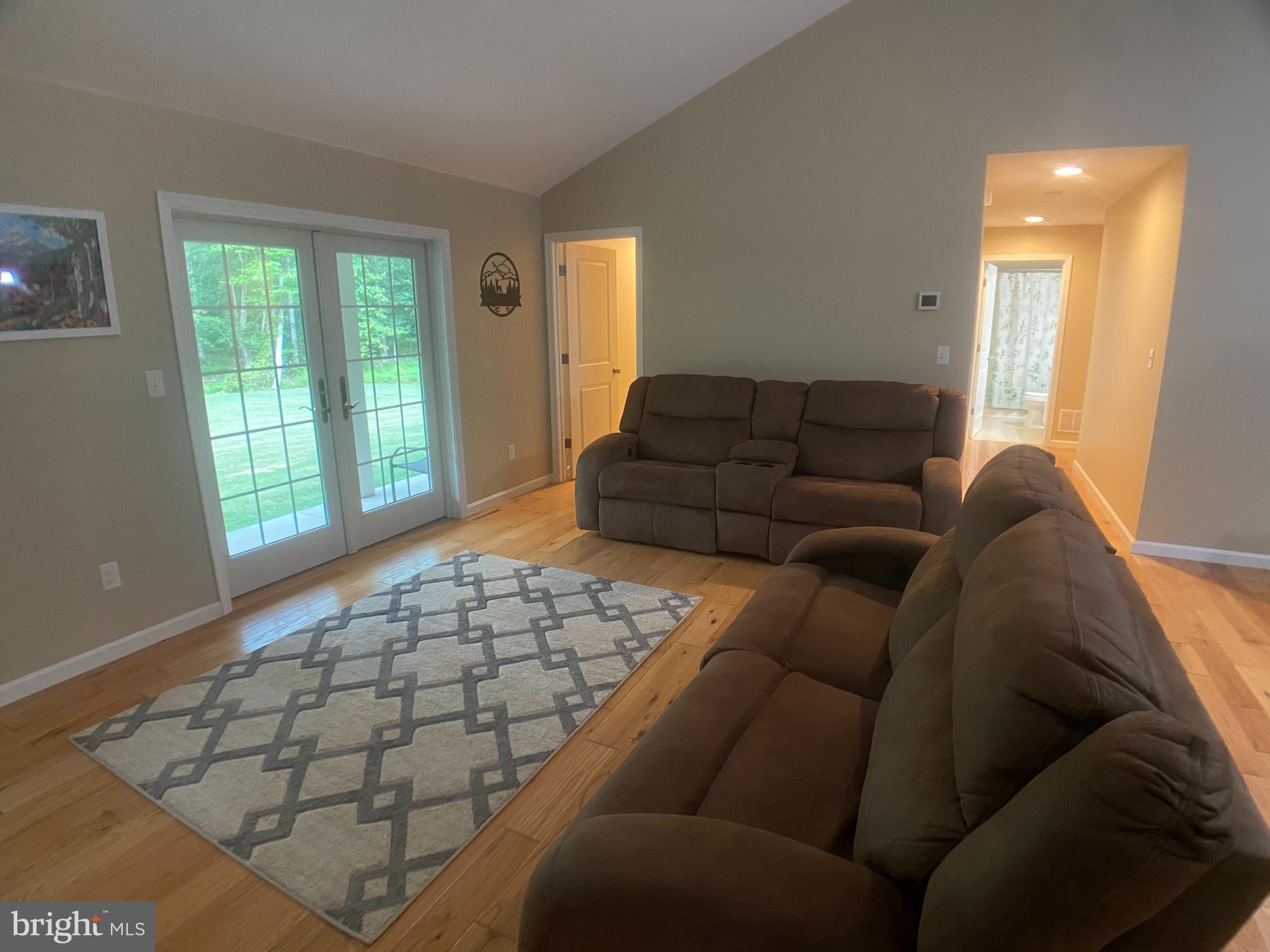 4740 Ford Fields Road Myersville, MD 21773 - Photo 55 of 147 a living room with a couch and a window