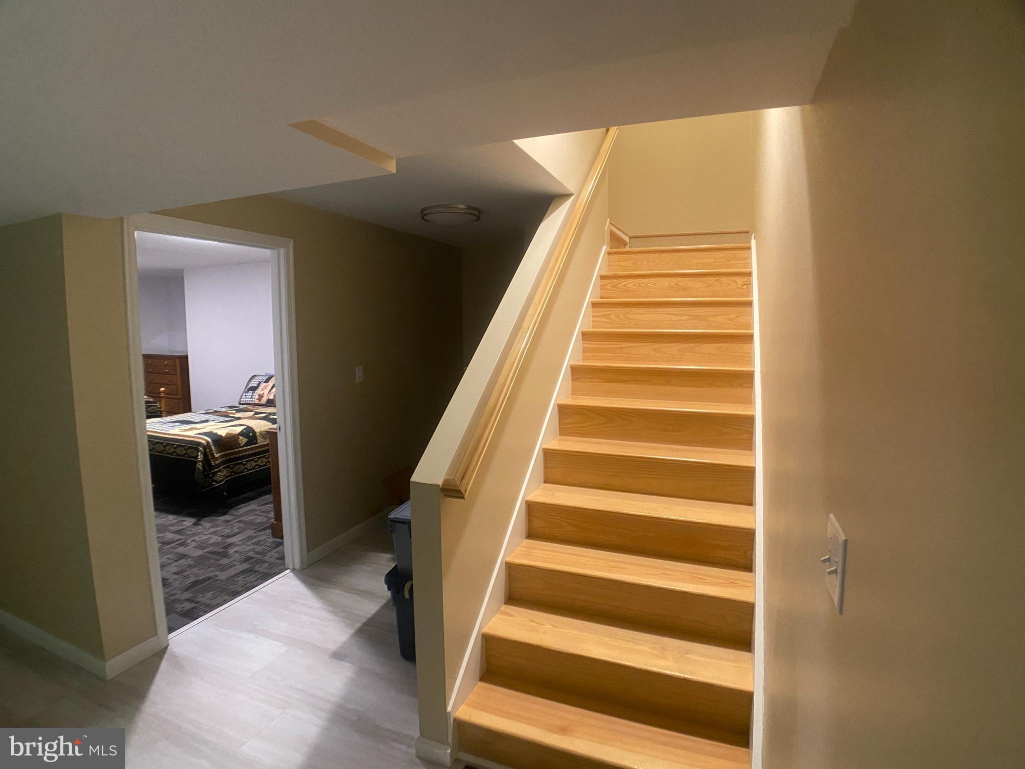 4740 Ford Fields Road Myersville, MD 21773 - Photo 75 of 147 a view of a hallway with wooden floor and entryway