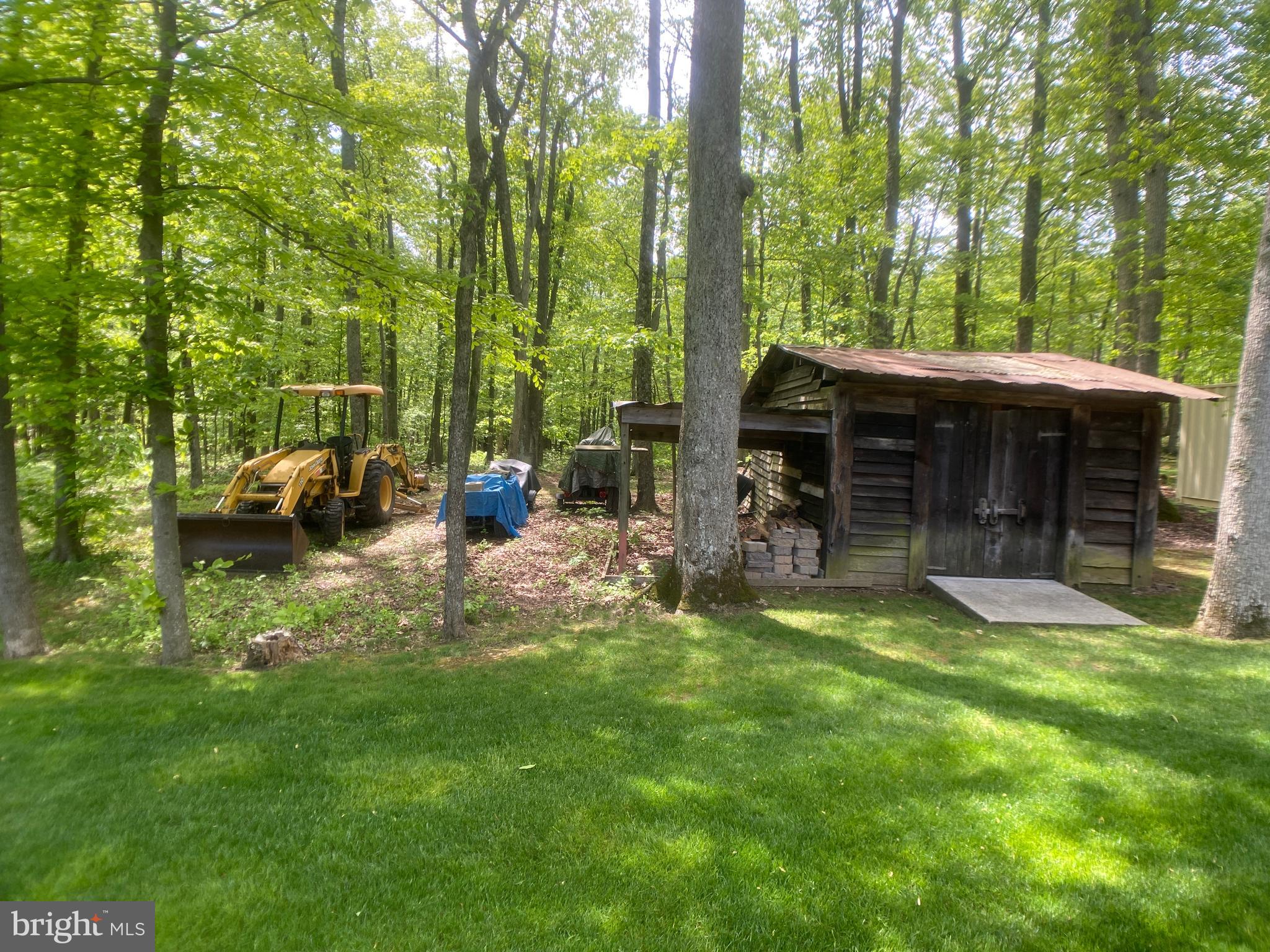 4740 Ford Fields Road Myersville, MD 21773 - Photo 97 of 147 a view of a house with backyard porch and sitting area