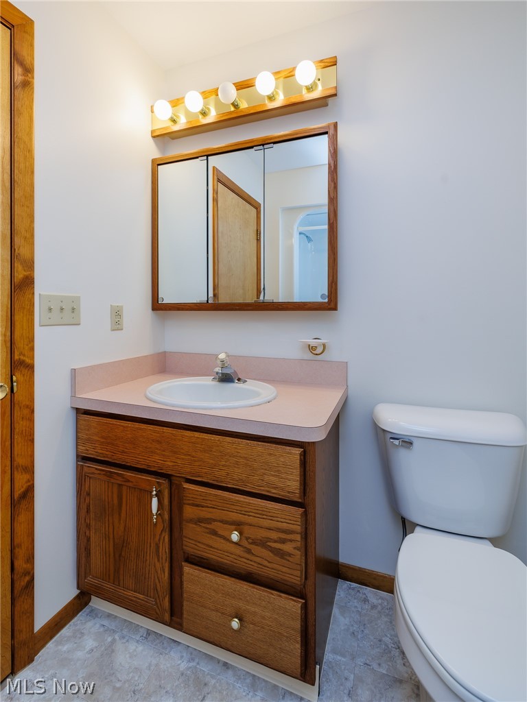 39816 Butternut Ridge Road Elyria, OH 44035 - Photo 24 of 45 Bathroom featuring tile patterned floors, vanity, and toilet