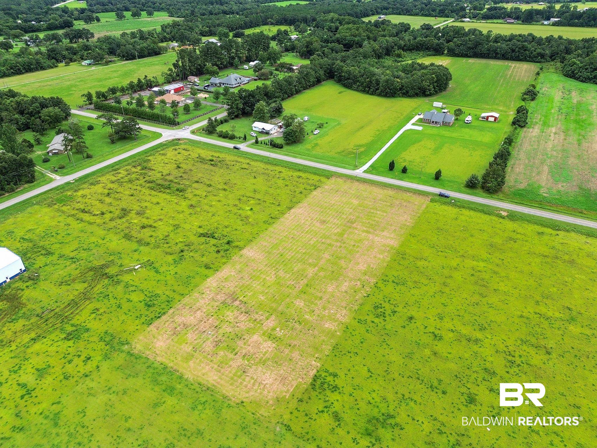 Lot 5 Brewer Road Robertsdale, AL 36567 - Photo 1 of 8 Aerial view featuring a rural view