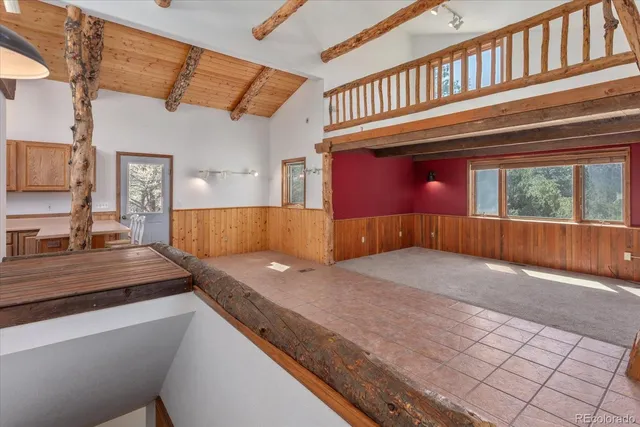 a kitchen with a stove and a sink