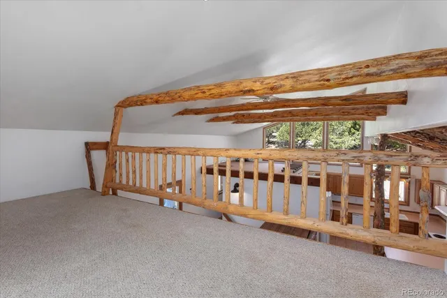 a view of a porch with a wooden floor