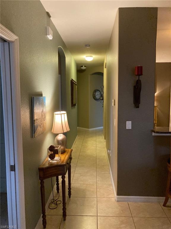 21334 Bella Terra Boulevard Estero, FL 33928 - Photo 14 of 30 a bathroom with a sink and a mirror