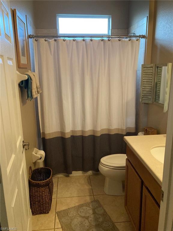 21334 Bella Terra Boulevard Estero, FL 33928 - Photo 22 of 30 a bathroom with a sink toilet and shower
