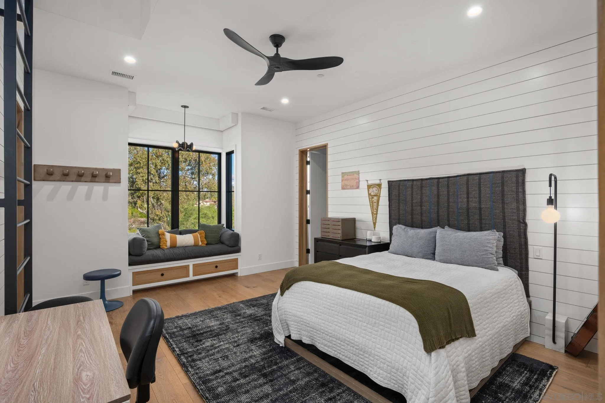 15550 El Camino Real Rancho Santa Fe, CA 92014 - Photo 29 of 35 This bedroom suite a built in ladder to up stairs bonus "hang out" area.