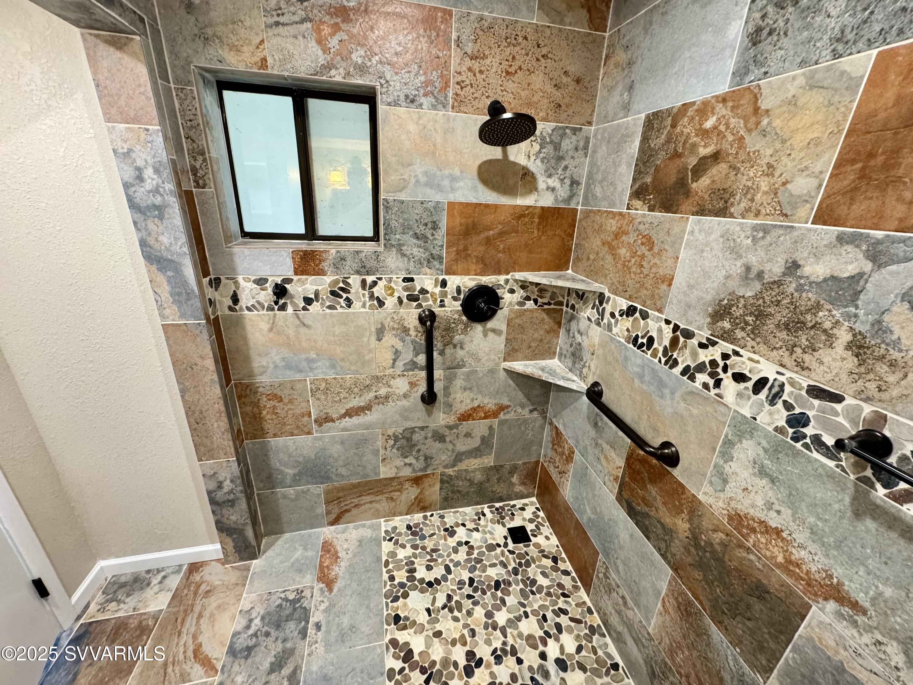 248 South River Cave Road Camp Verde, AZ 86322 - Photo 16 of 36 a bathroom with a bathtub and shower