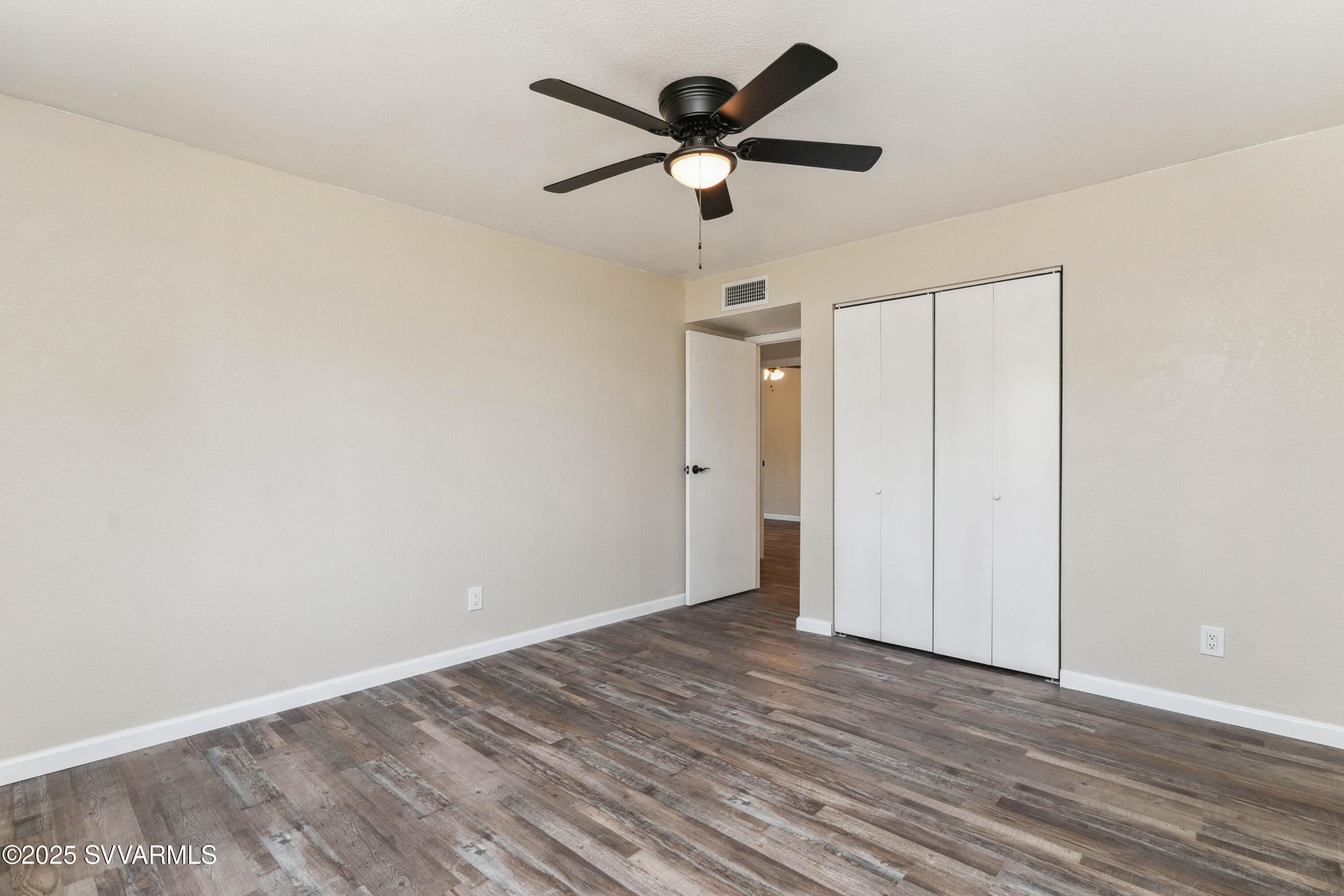 248 South River Cave Road Camp Verde, AZ 86322 - Photo 17 of 36 wooden floor in an empty room