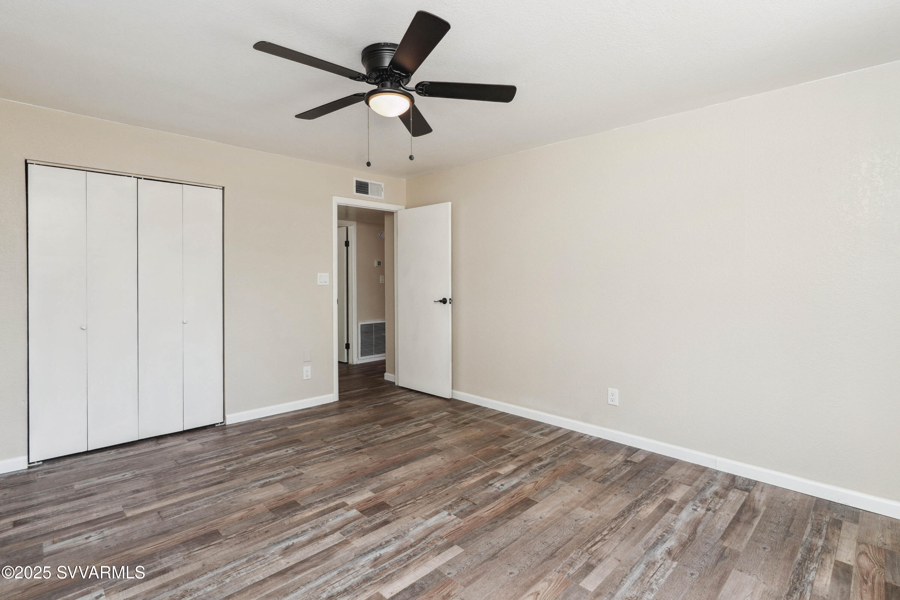 248 South River Cave Road Camp Verde, AZ 86322 - Photo 21 of 36 wooden floor in an empty room