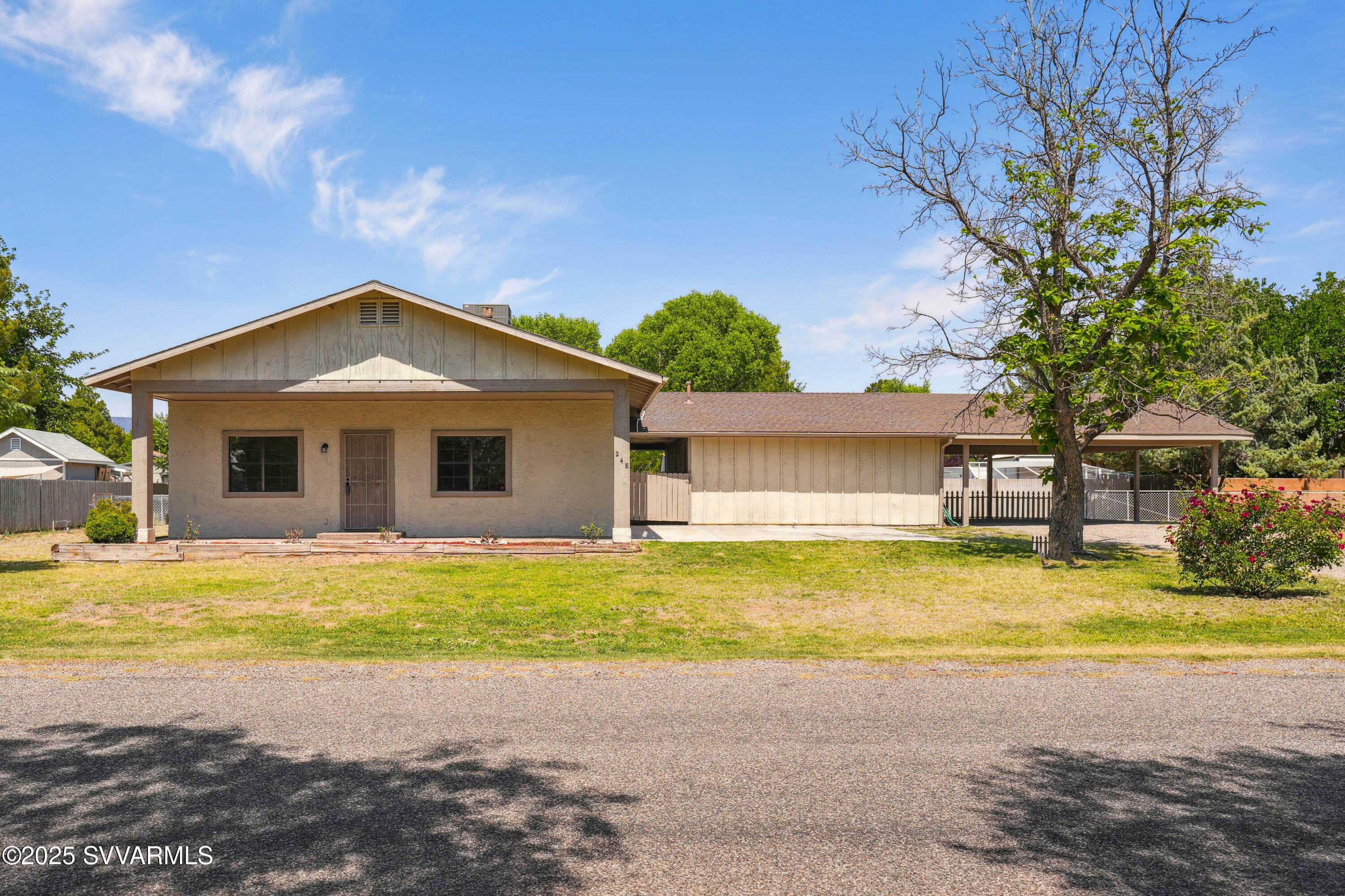 248 South River Cave Road Camp Verde, AZ 86322 - Photo 35 of 36 a view of a house with swimming pool and a yard