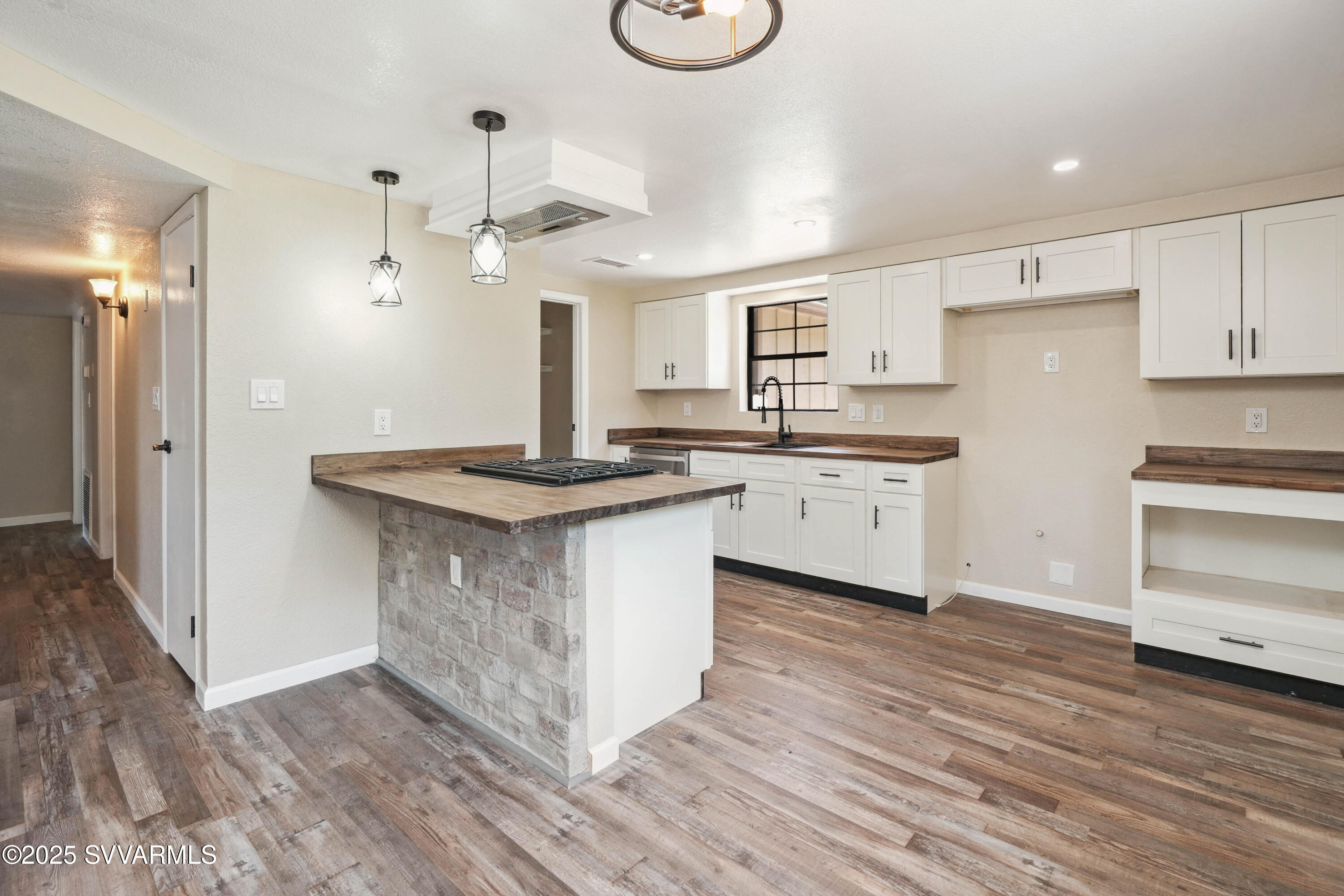 248 South River Cave Road Camp Verde, AZ 86322 - Photo 7 of 36 a kitchen with a sink cabinets and wooden floor