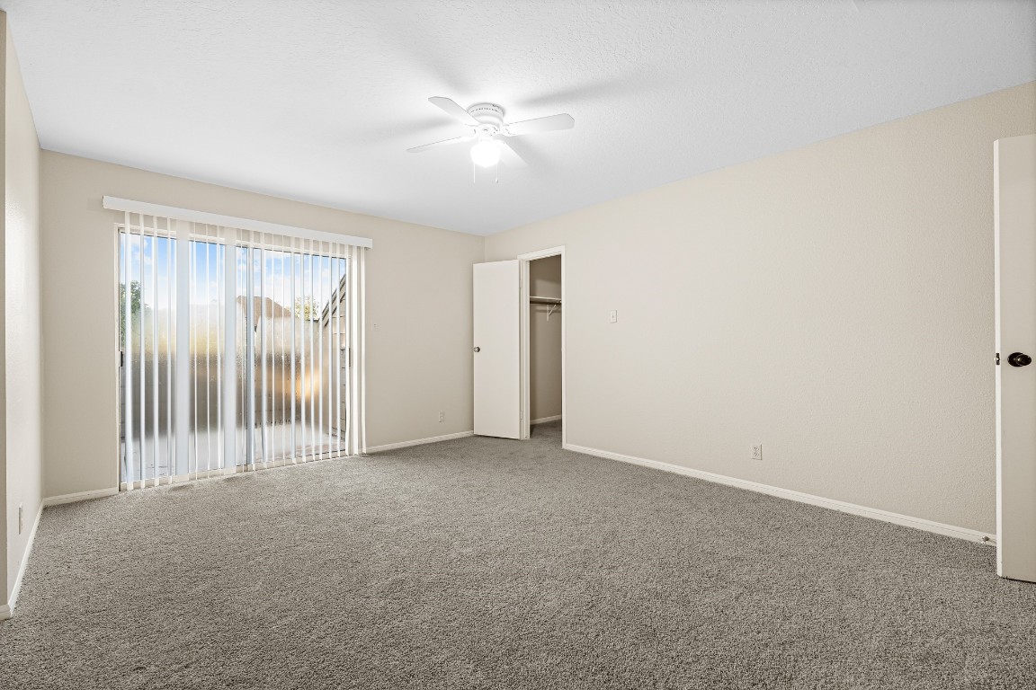 304 East Adoue Street Alvin, TX 77511 - Photo 7 of 12 a view of an empty room with a window