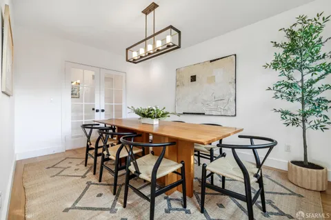 a bathroom with a shower toilet and sink