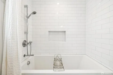 a bedroom with a bed and a closet