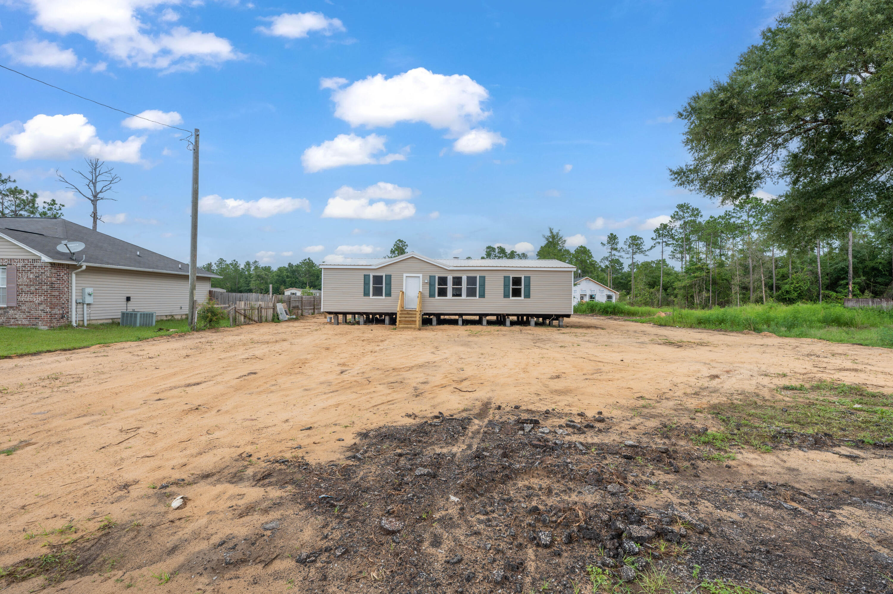 4625 Canary Way Crestview, FL 32539 - Photo 34 of 40 a house view with a big yard