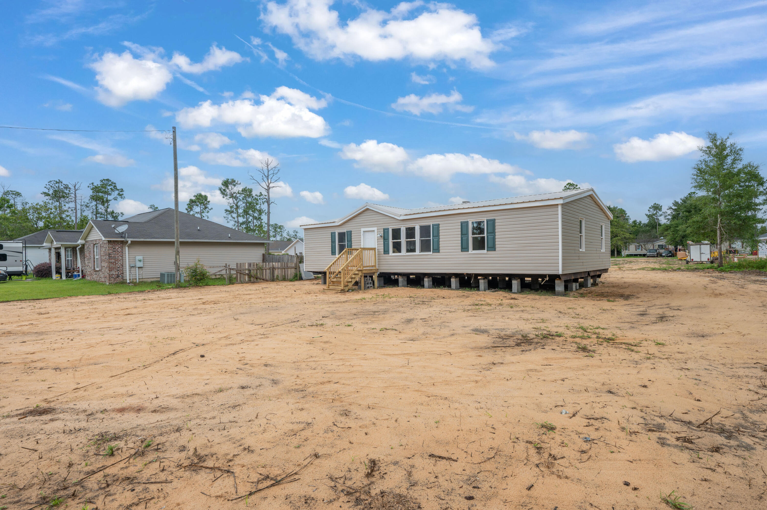 4625 Canary Way Crestview, FL 32539 - Photo 36 of 40 a view of a house with a yard