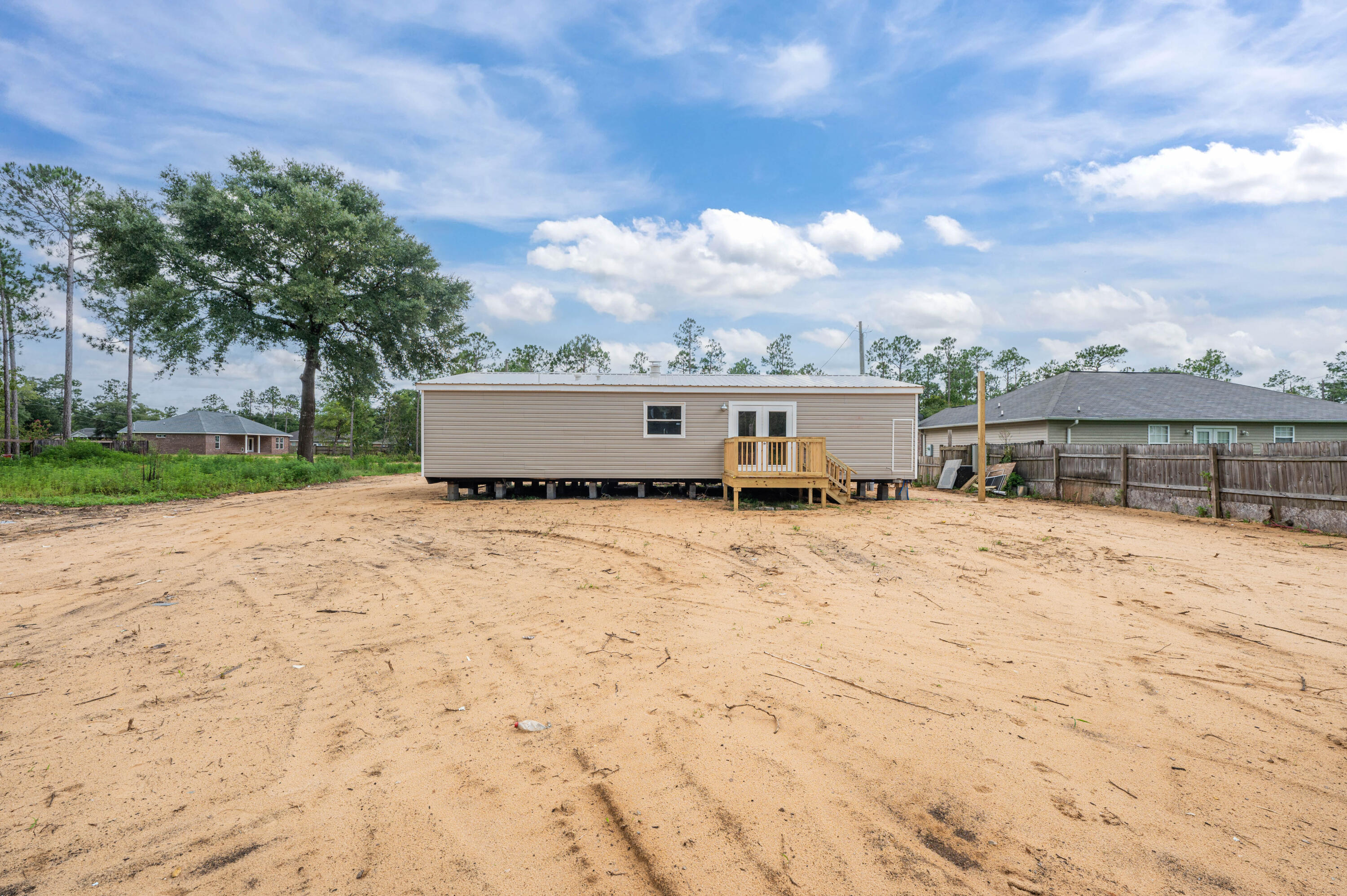 4625 Canary Way Crestview, FL 32539 - Photo 38 of 40 a view of a terrace with yard