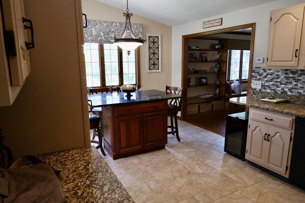 6 Crestlan Drive Worcester, MA 01604 - Photo 16 of 41 a kitchen with stainless steel appliances granite countertop a stove a sink and a refrigerator