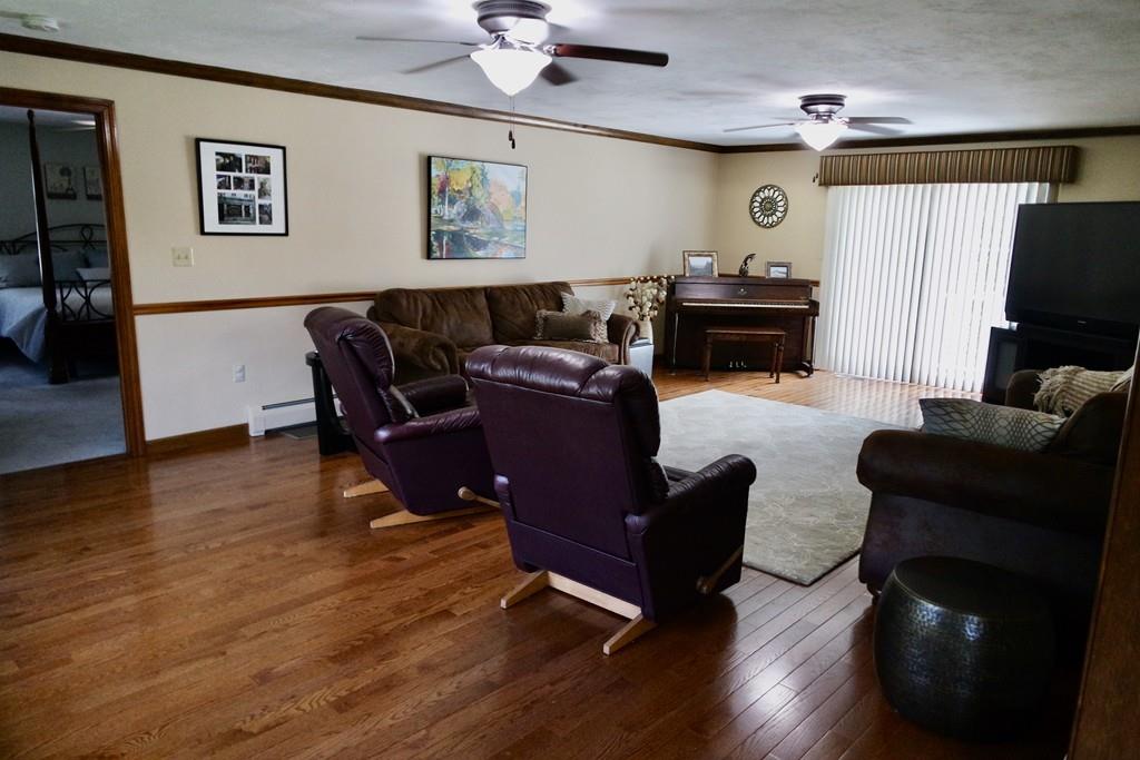 6 Crestlan Drive Worcester, MA 01604 - Photo 17 of 41 a living room with furniture and a flat screen tv