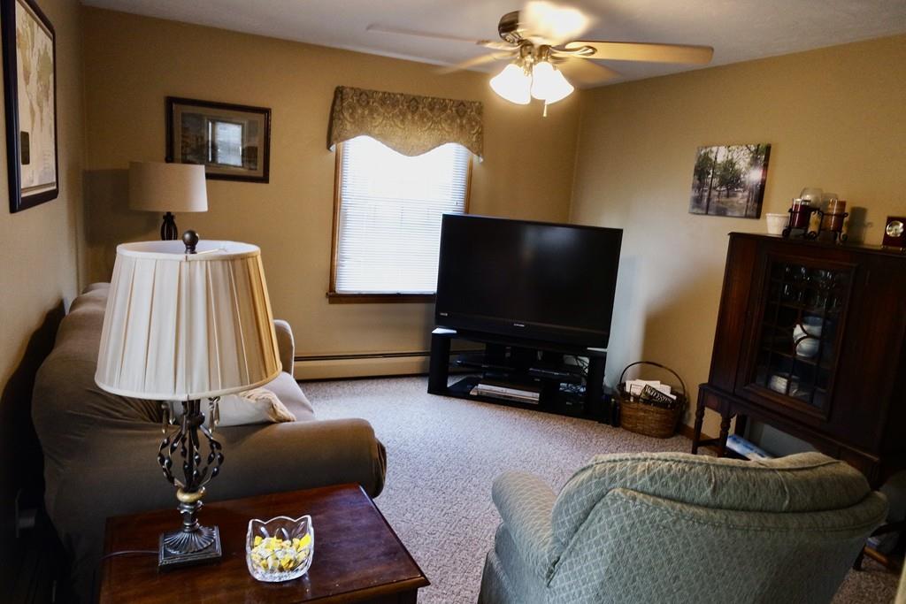 6 Crestlan Drive Worcester, MA 01604 - Photo 29 of 41 a living room with furniture and a flat screen tv