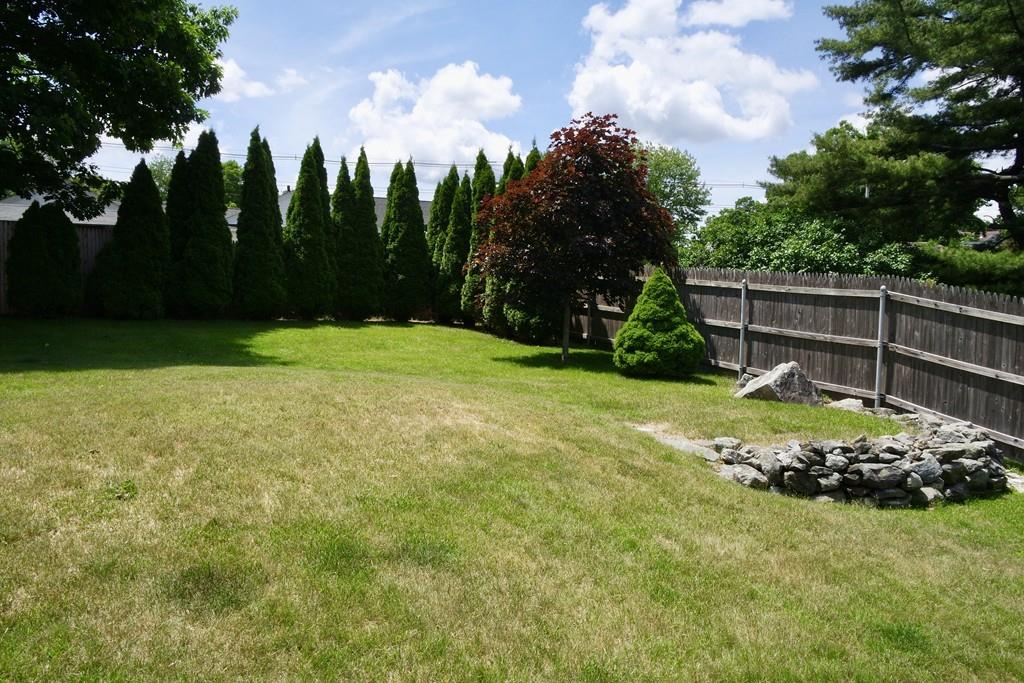 6 Crestlan Drive Worcester, MA 01604 - Photo 8 of 41 a garden with trees in the background