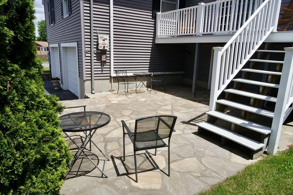 6 Crestlan Drive Worcester, MA 01604 - Photo 9 of 41 a view of backyard with sitting area