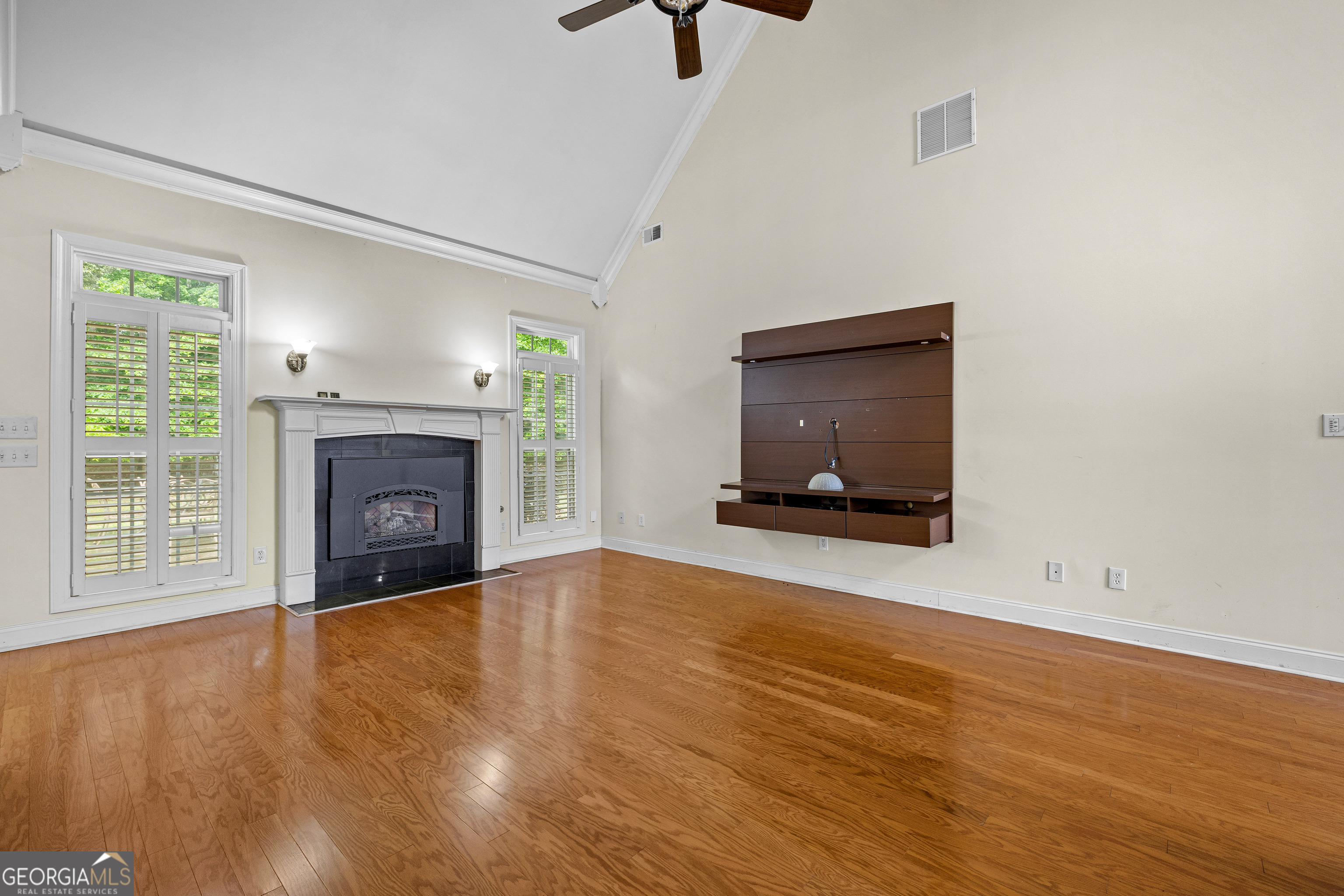120 Shankhill Ridge Tyrone, GA 30290 - Photo 10 of 54 a view of empty room with wooden floor and fireplace